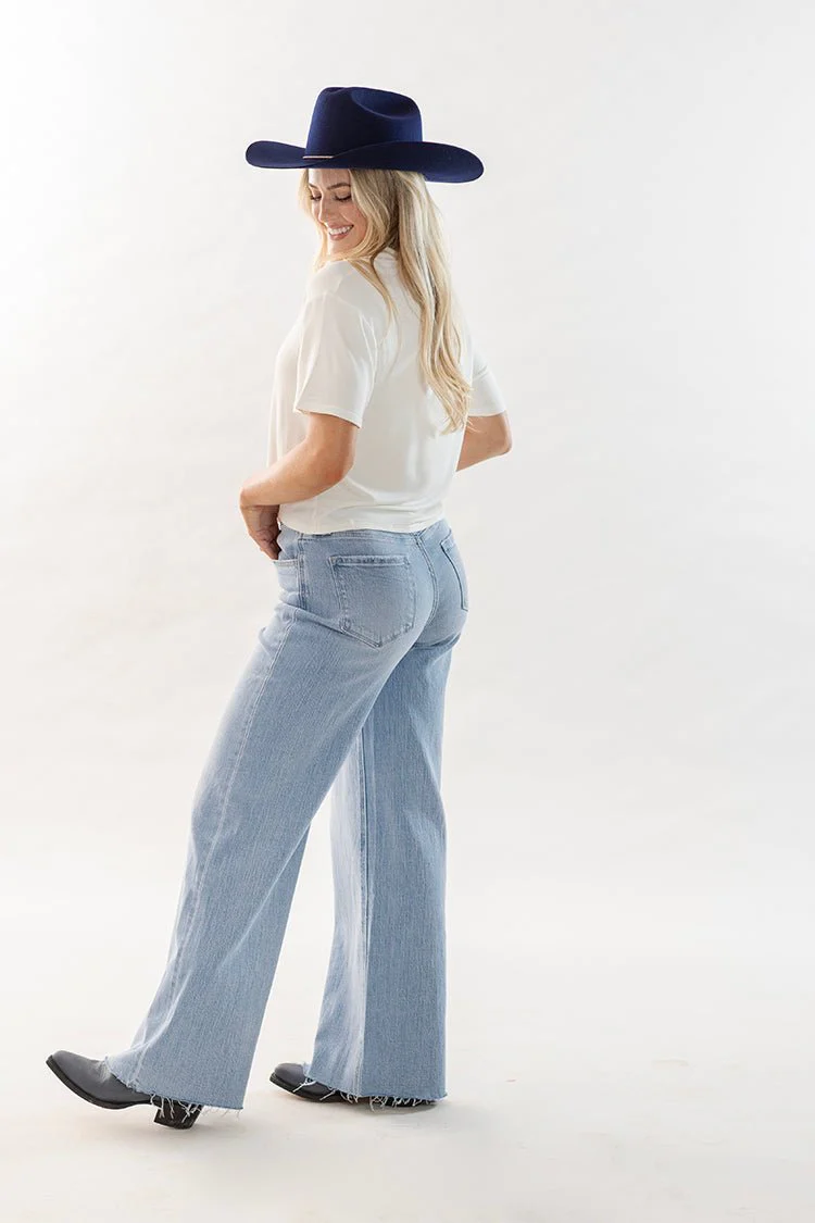 Light Wash Distressed Hem Wide Leg Jeans - Image 2